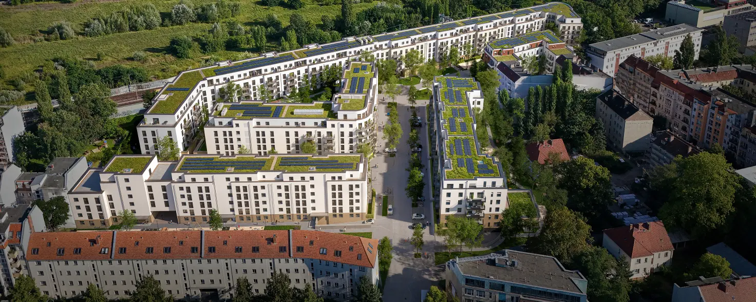 Visualisierung: Das Neubauquartier Staytion mit 544 Wohnungen in Berlin-Pankow aus der Luft.